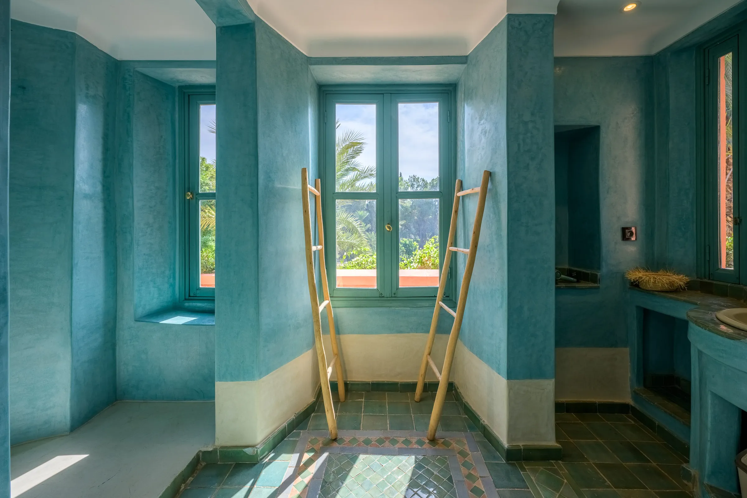 Villa Calypso, private villa rental in the Palmeraie, Marrakech: turquoise tadelakt bathroom
