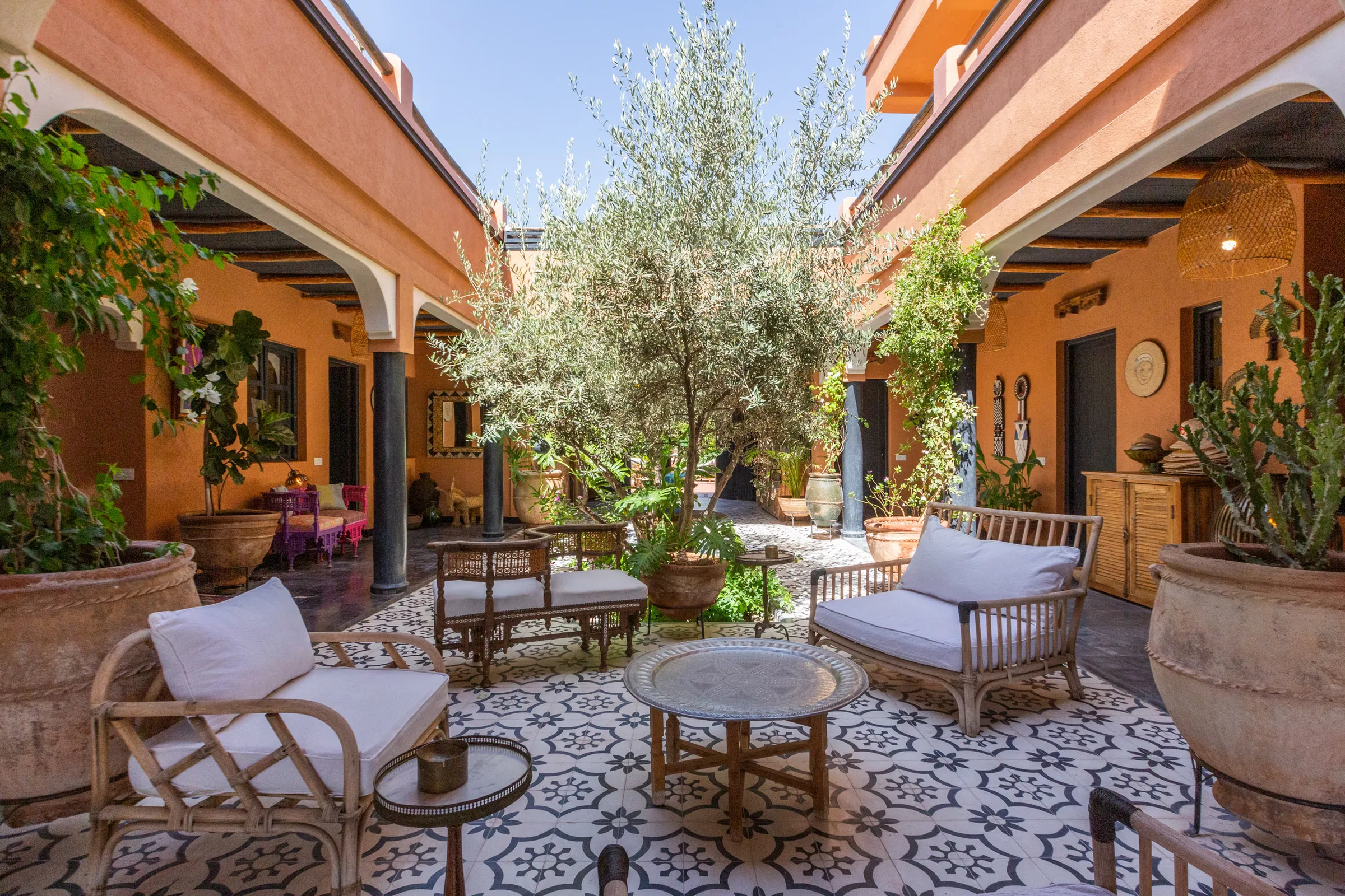 Villa Cassia, private villa rental on the Route de Tahanaout, Marrakech: inner patio with olive tree and cement tiles