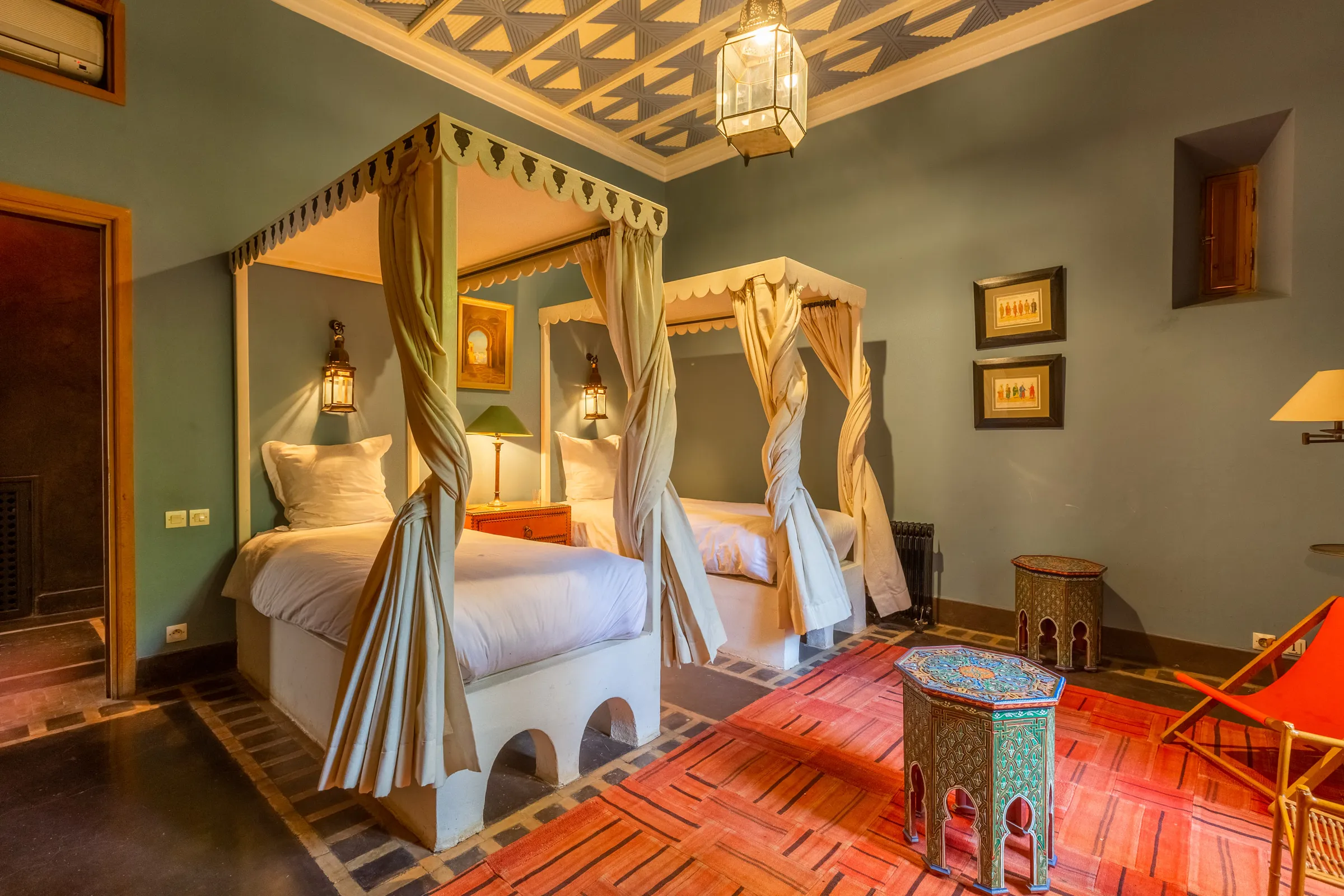 Villa Amalthea, private villa rental in the Palmeraie, Marrakech: twin bedroom with canopy beds