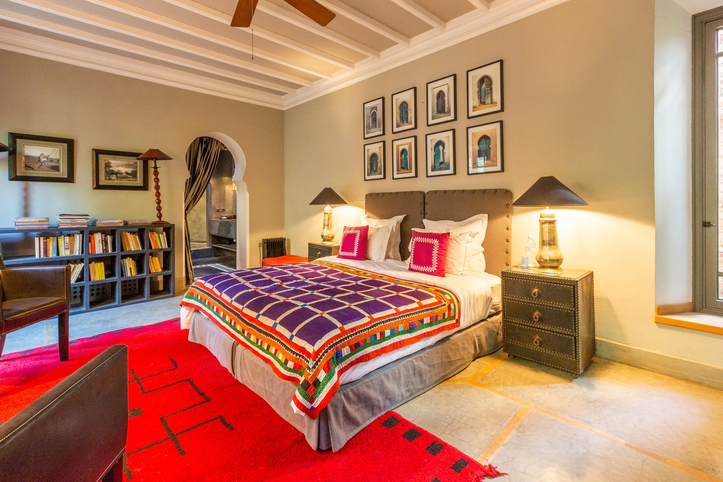 Villa Amalthea, private villa rental in the Palmeraie, Marrakech: bedroom with purple patterned bedspread