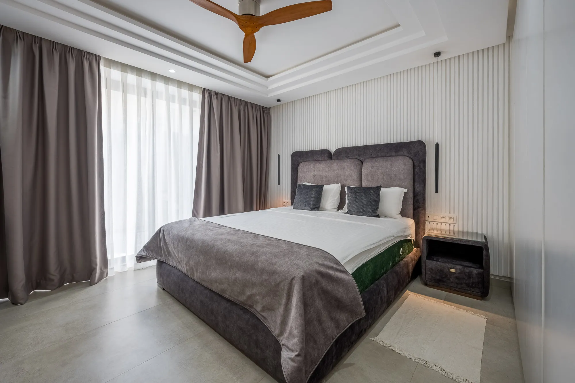 Villa Daphne, private villa rental at Amelkis Golf, Marrakech: bedroom with grey upholstered bed