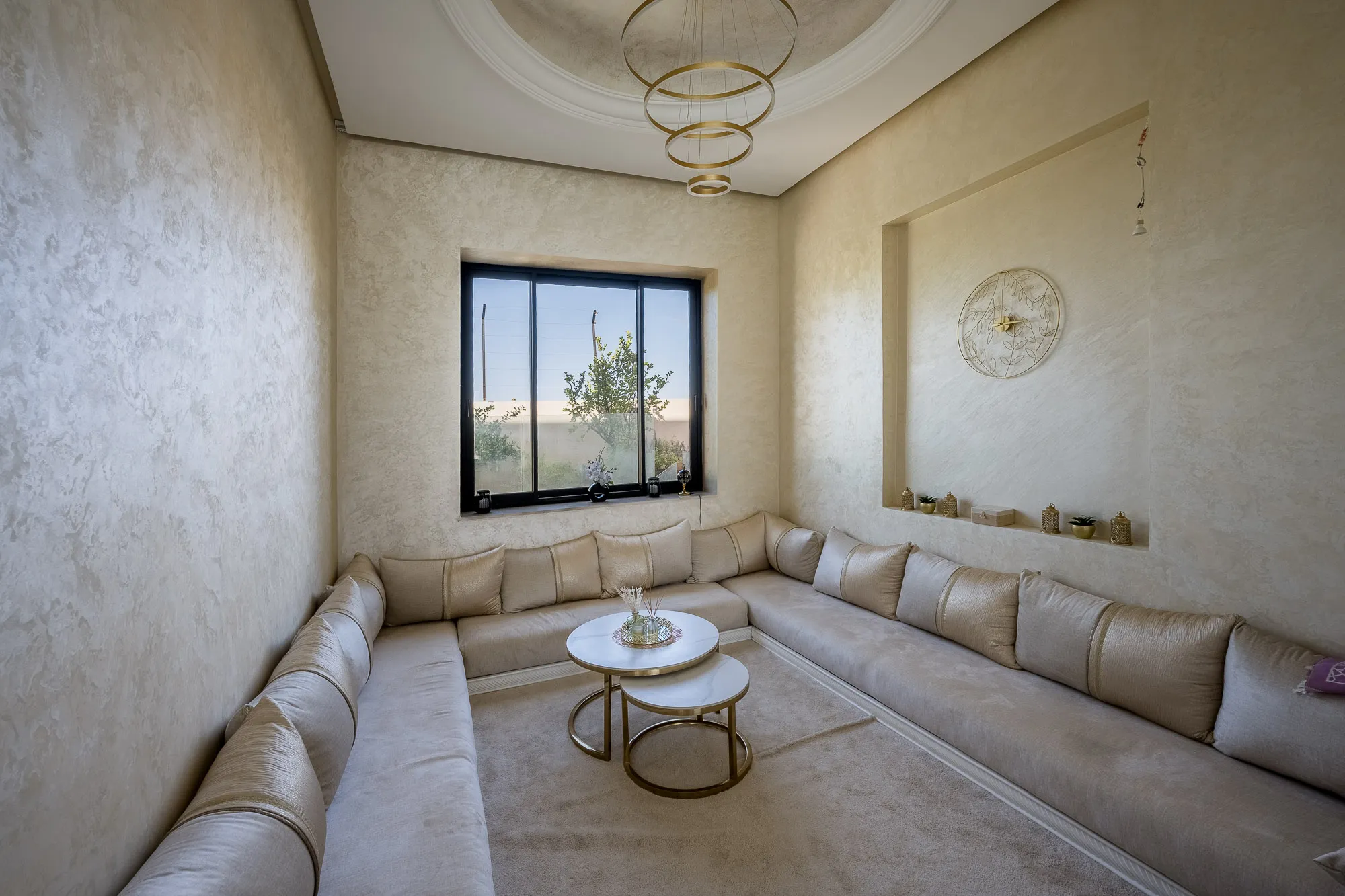 Villa Daphne, private villa rental at Amelkis Golf, Marrakech: Moroccan lounge with built-in banquette seating