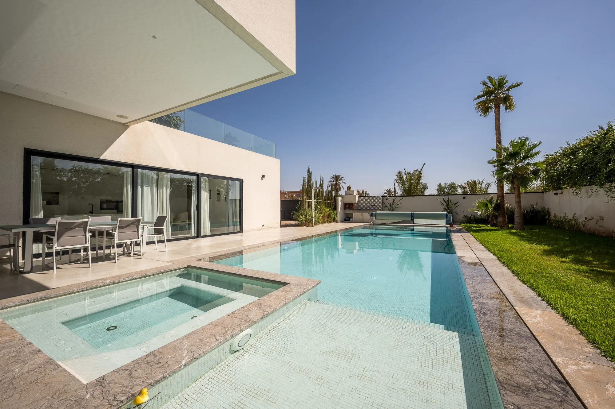 Villa Daphne, private villa rental at Amelkis Golf, Marrakech: pool with a shallow basin beside the covered terrace