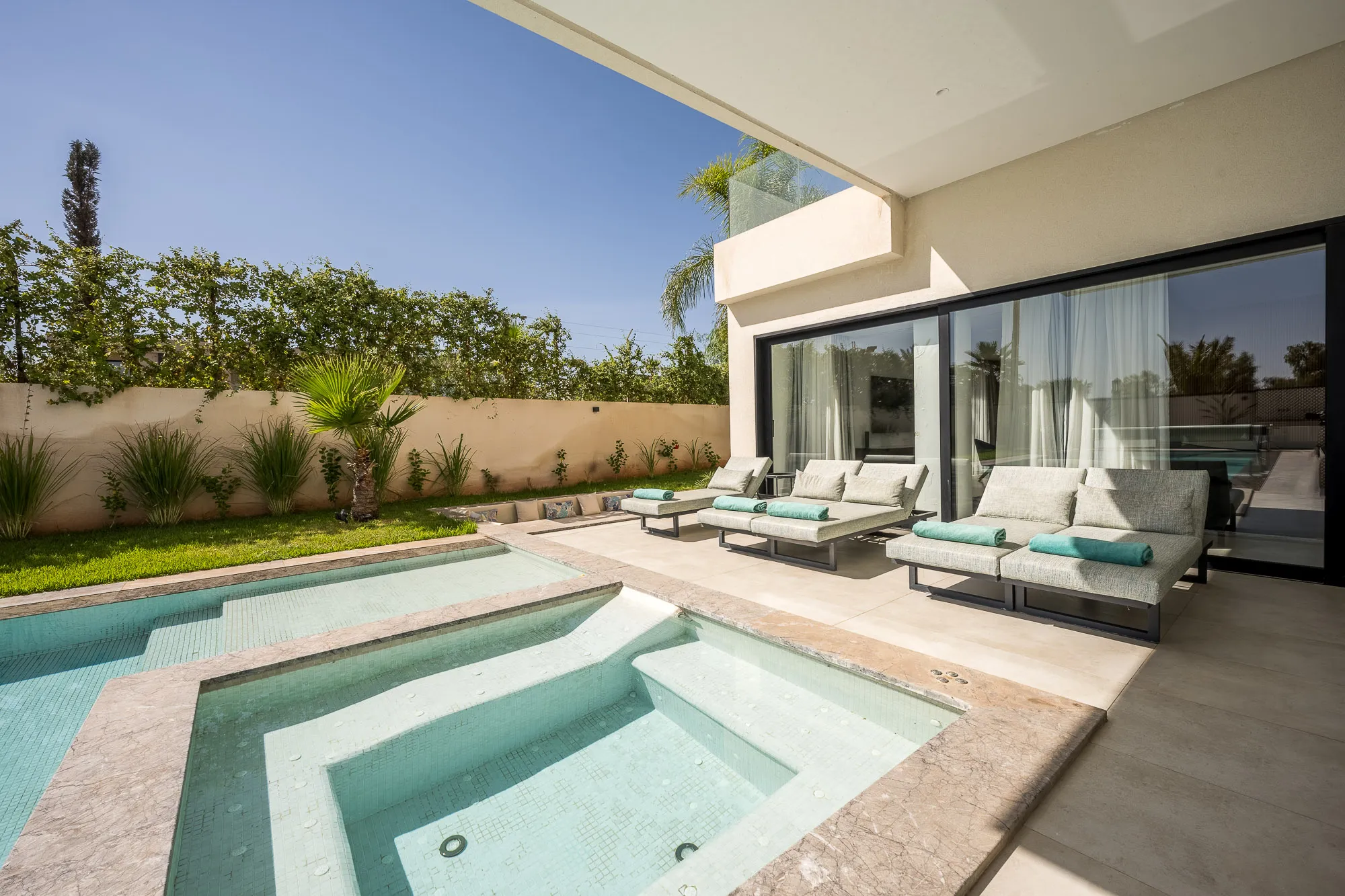 Villa Daphne, private villa rental at Amelkis Golf, Marrakech: sun loungers on the pool terrace