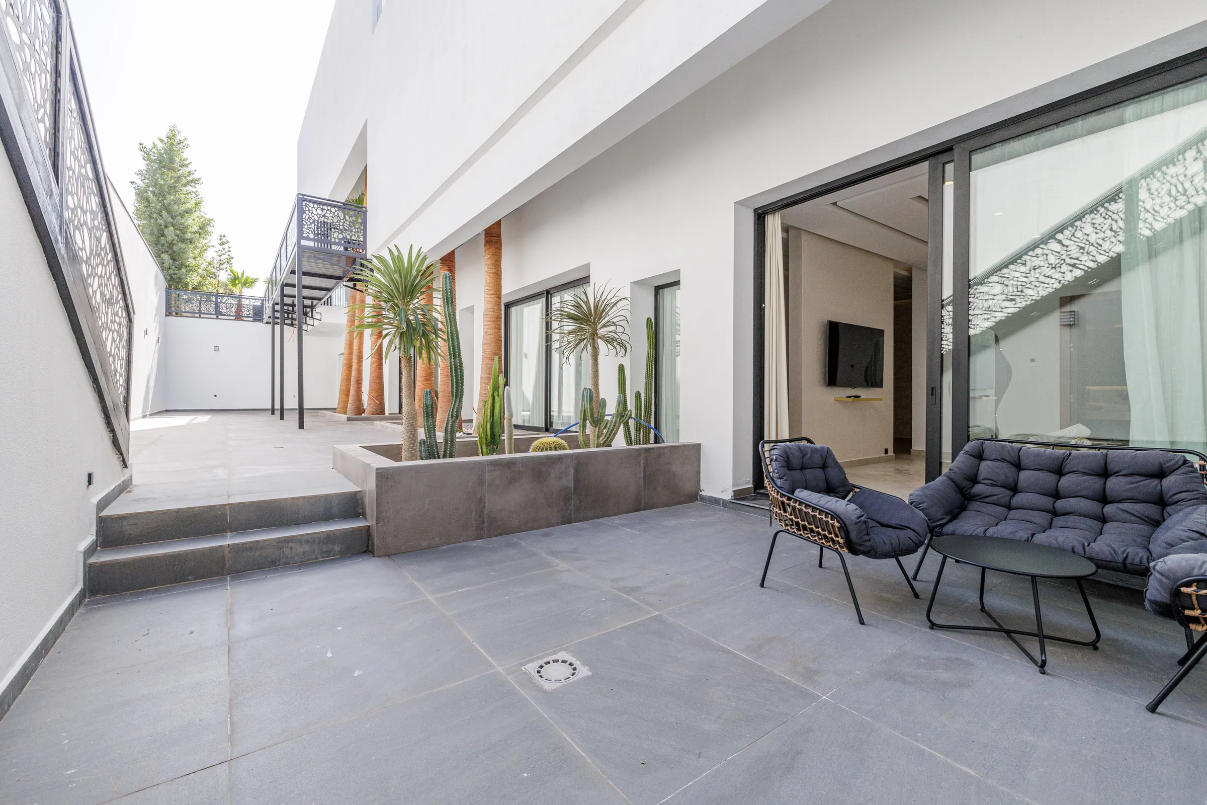 Villa Nefeli, private villa rental at Amelkis Golf, Marrakech: patio with outdoor seating