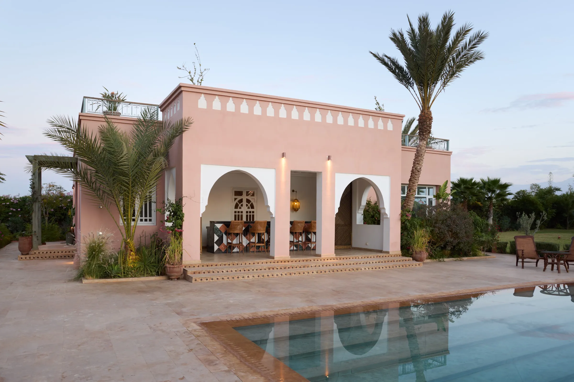 Villa Nyx, private villa rental on the Route d'Amizmiz, Marrakech: arched garden pavilion beside the pool
