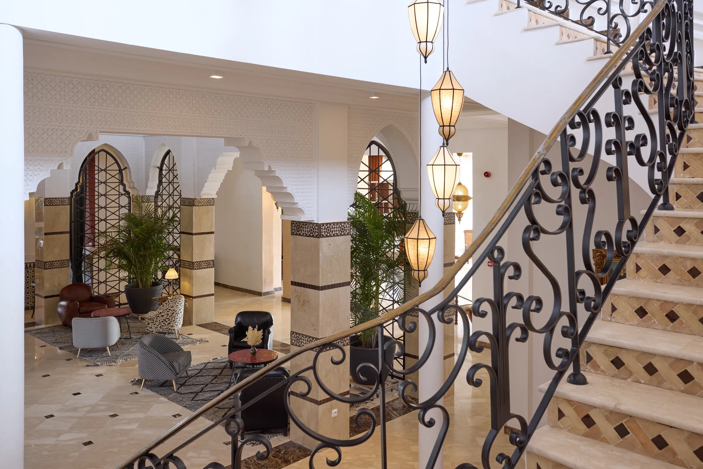 Villa Nyx, private villa rental on the Route d'Amizmiz, Marrakech: grand staircase with wrought iron banister