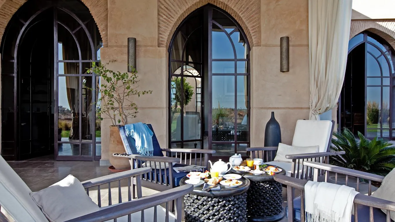 Villa Myrto, private villa rental at Amelkis Golf, Marrakech: terrace with armchairs and tea table