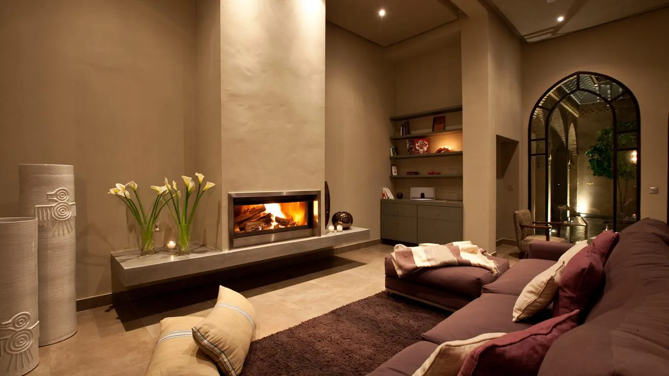 Villa Myrto, private villa rental at Amelkis Golf, Marrakech: lounge with fireplace