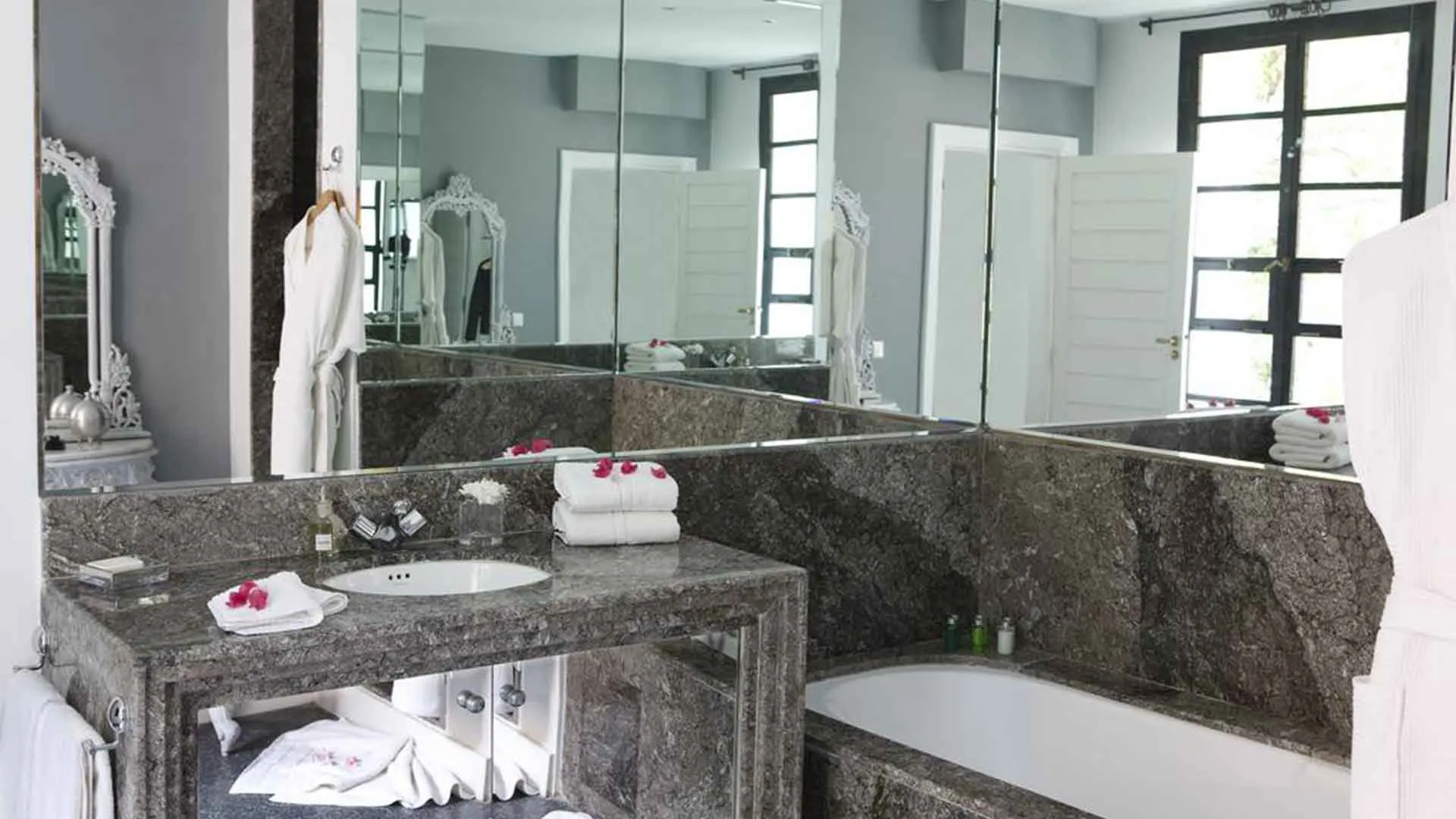 Villa Leda, private villa rental near Majorelle, Marrakech: marble bathroom with vanity and bathtub