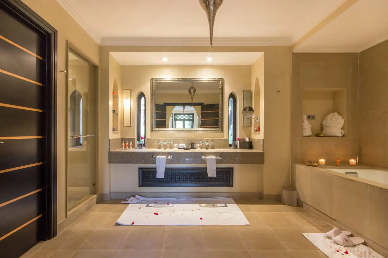 Villa Kyma, private villa rental at the Four Seasons Resort, Marrakech: bathroom with double vanity and bathtub