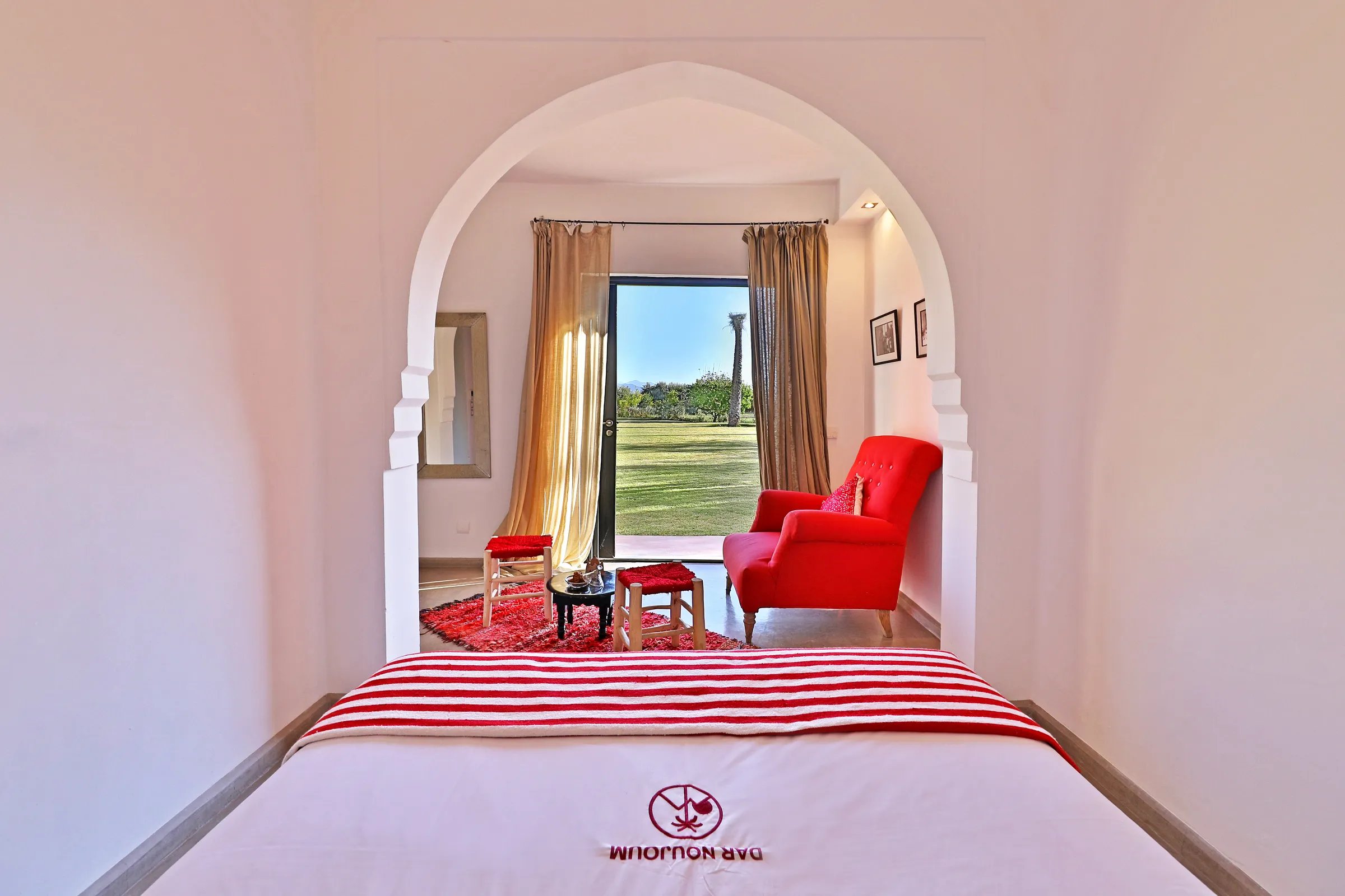 Villa Iliana, private villa rental on the Route de l'Ourika, Marrakech: bedroom looking out onto the garden