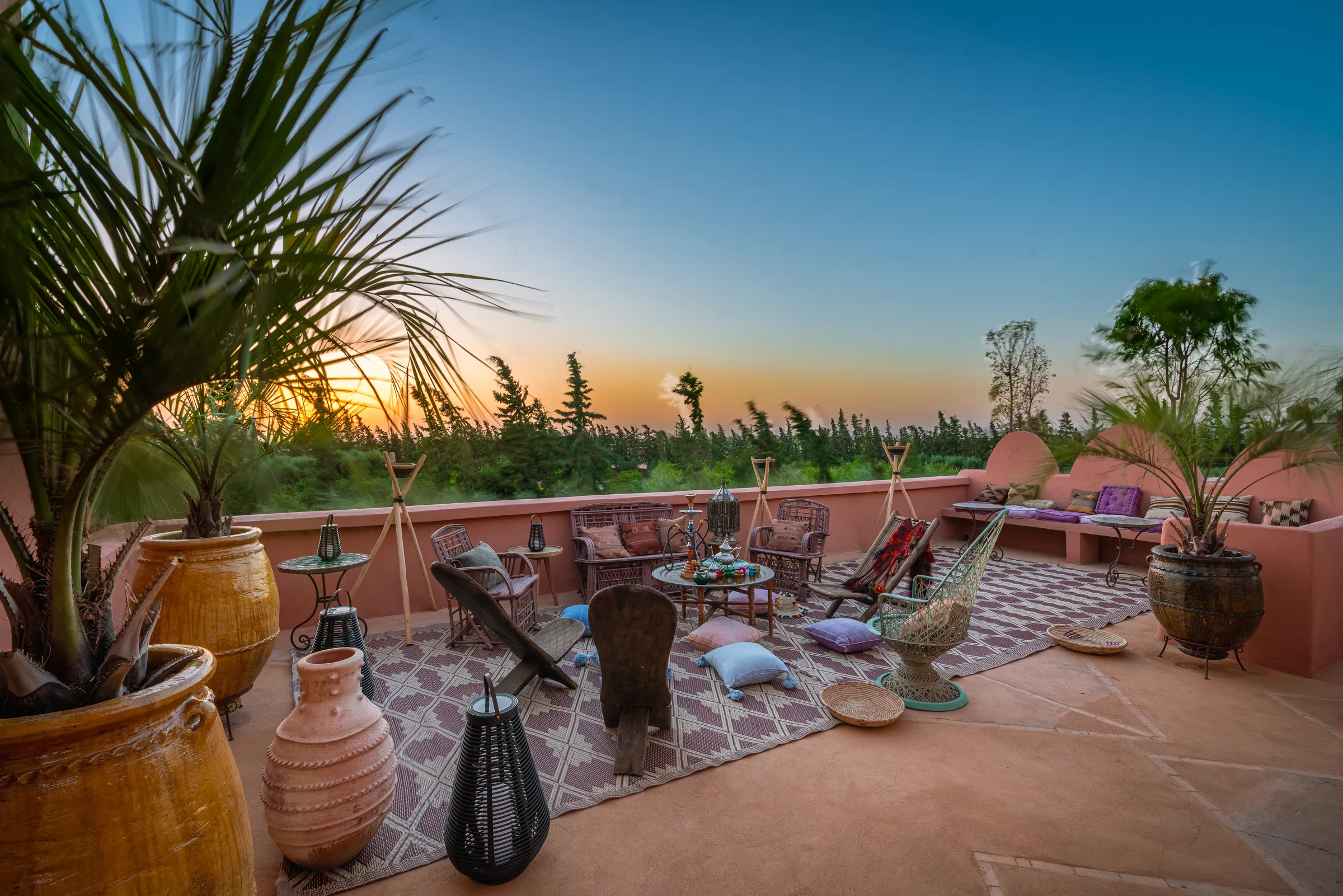 Villa Lyra, private villa rental in Ouled Hassoune, Marrakech: rooftop terrace lounge at sunset