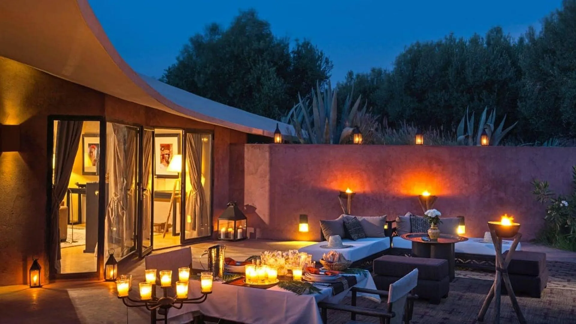 Villa Phaedra, private estate rental in Ouled Hassoune, Marrakech: candlelit lounge under the pavilion