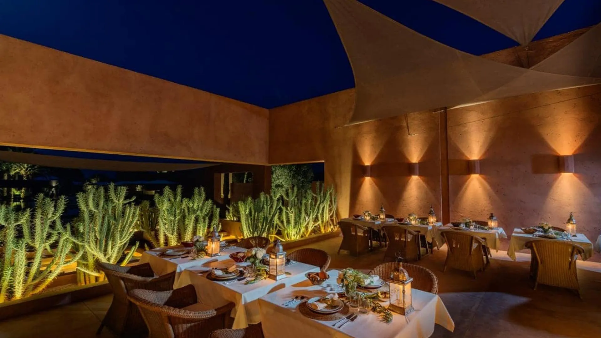 Villa Phaedra, private estate rental in Ouled Hassoune, Marrakech: candlelit patio dinner