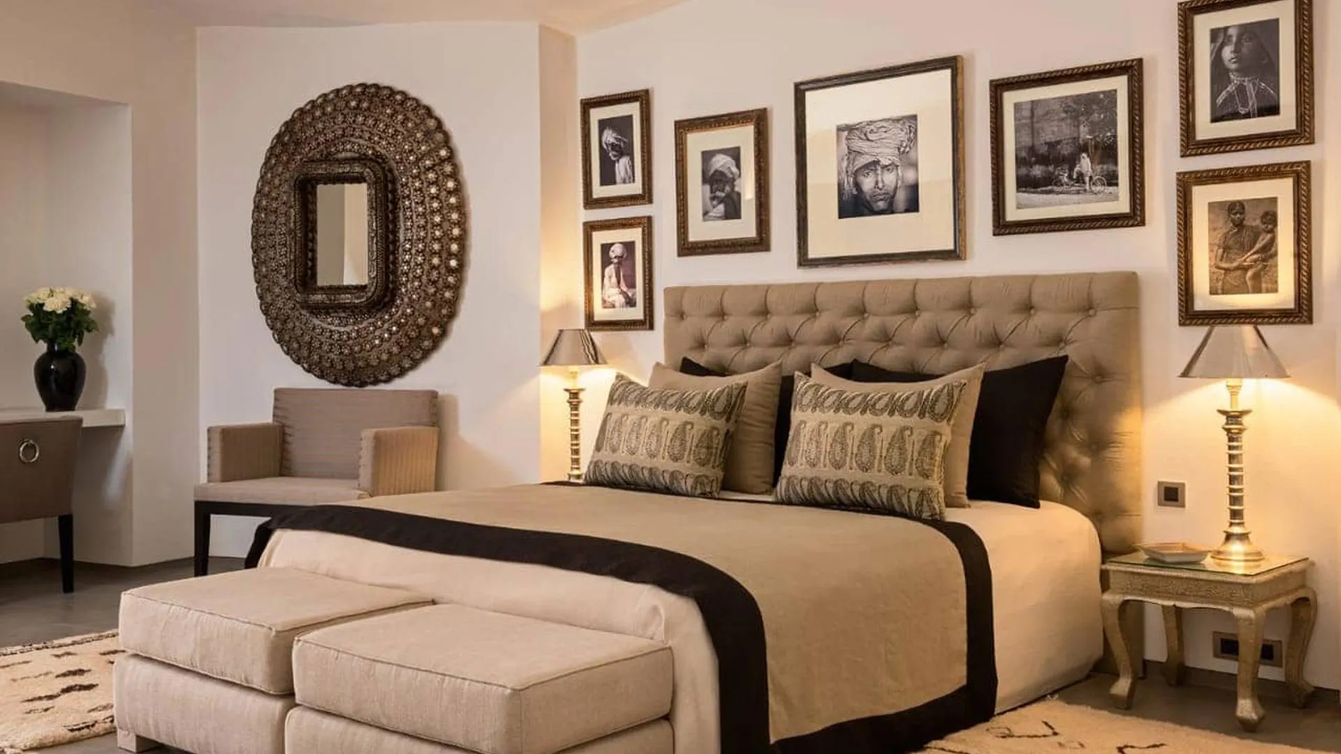 Villa Phaedra, private estate rental in Ouled Hassoune, Marrakech: beige bedroom with framed photos