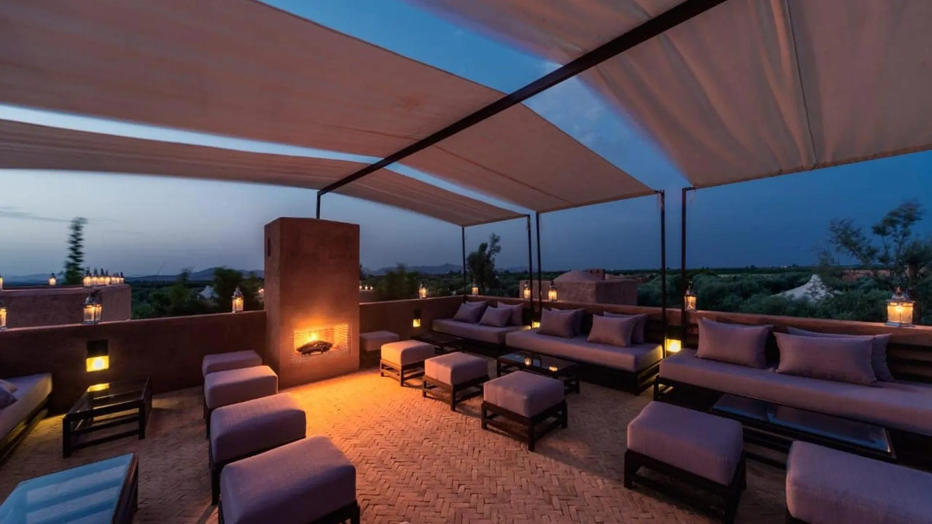 Villa Phaedra, private estate rental in Ouled Hassoune, Marrakech: shaded rooftop lounge