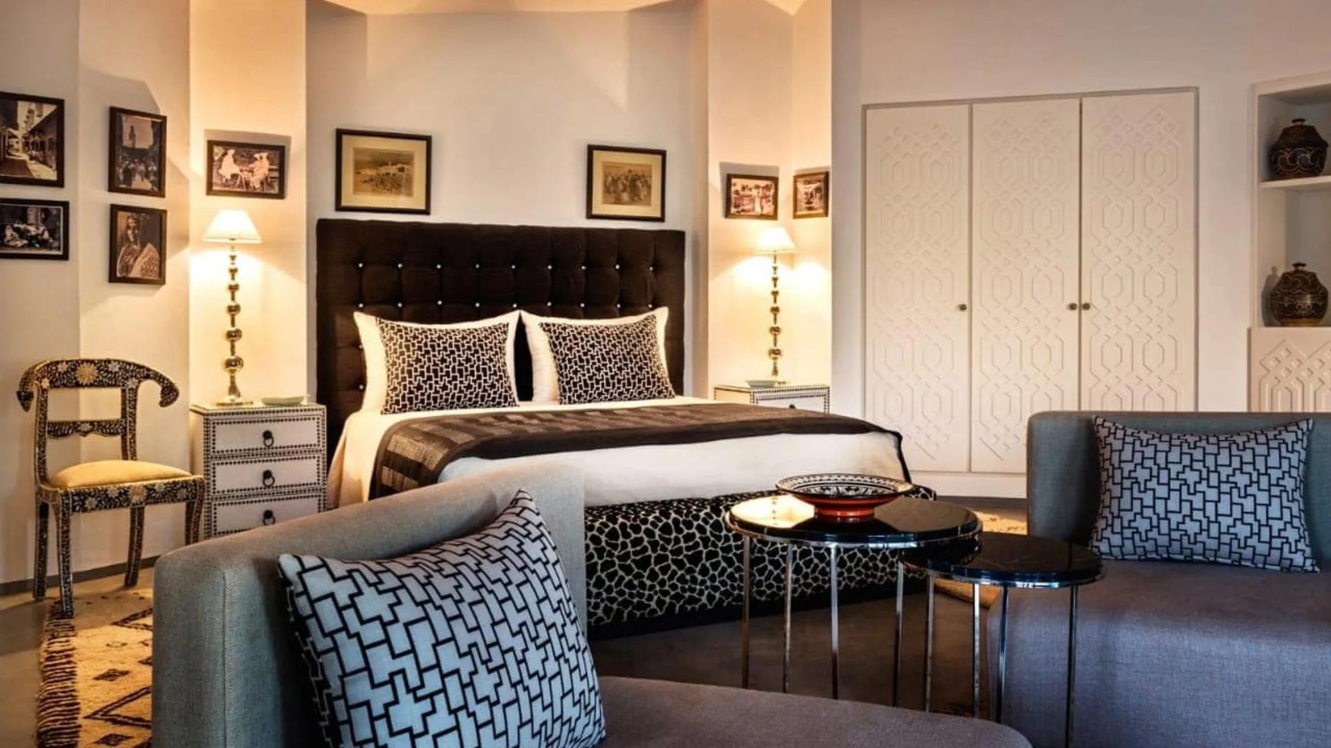 Villa Phaedra, private estate rental in Ouled Hassoune, Marrakech: bedroom with patterned cushions