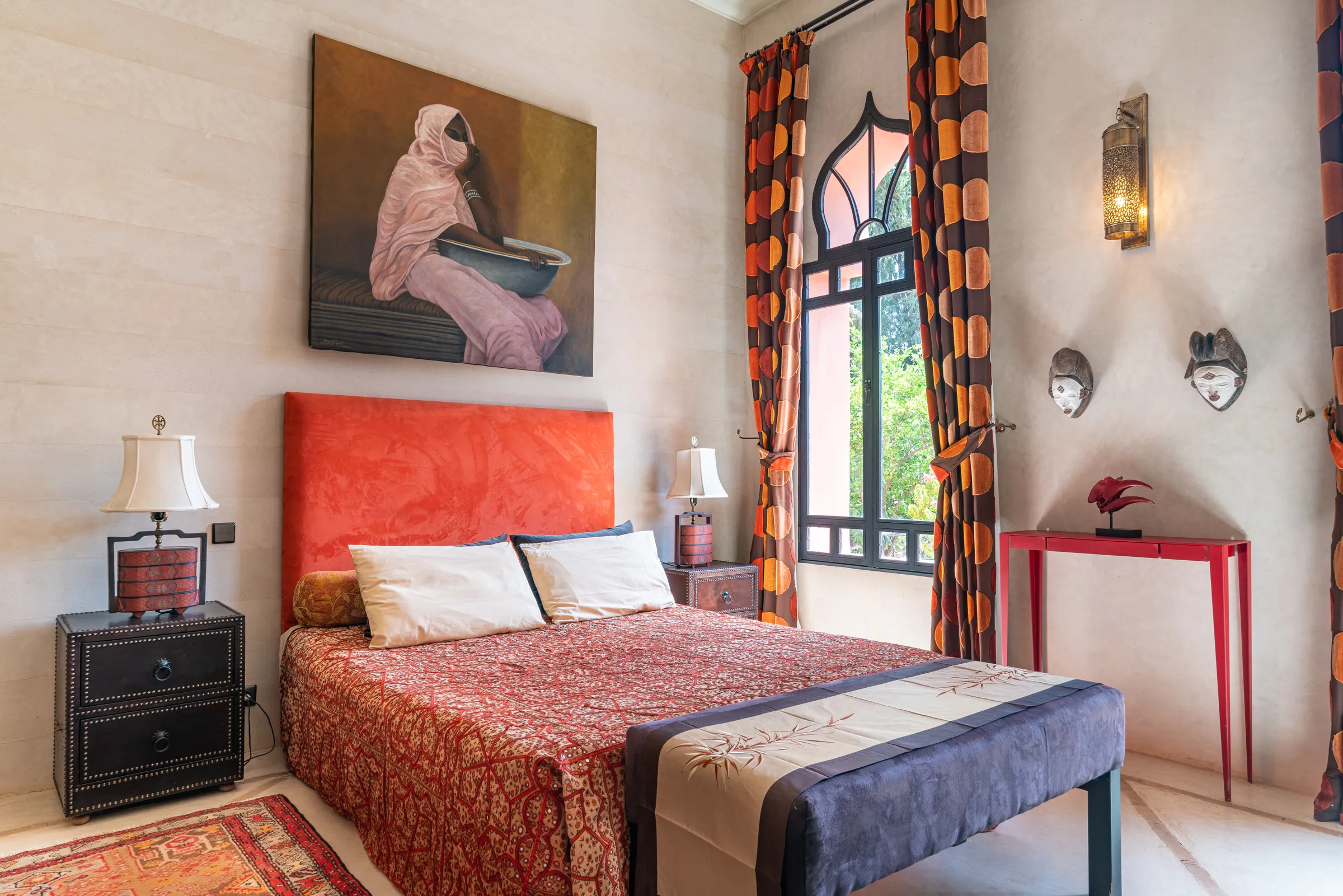 Villa Lyra, private villa rental in Ouled Hassoune, Marrakech: bedroom with red headboard