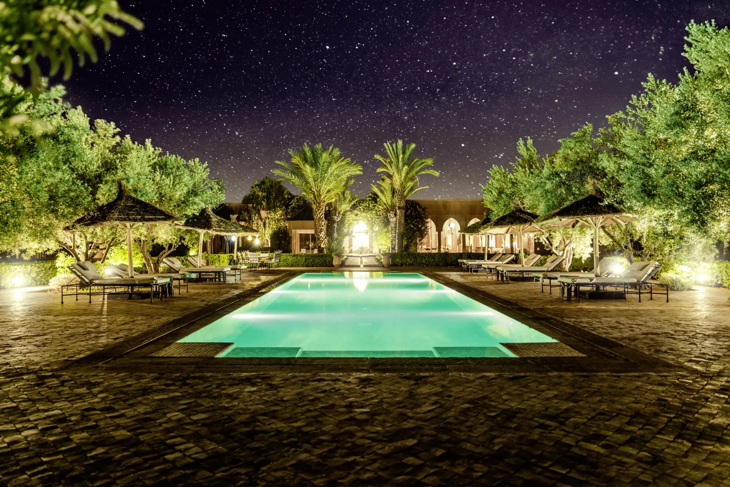 Villa Danae, private villa rental in Sidi Abdellah Ghiat, Marrakech: pool lit up at night