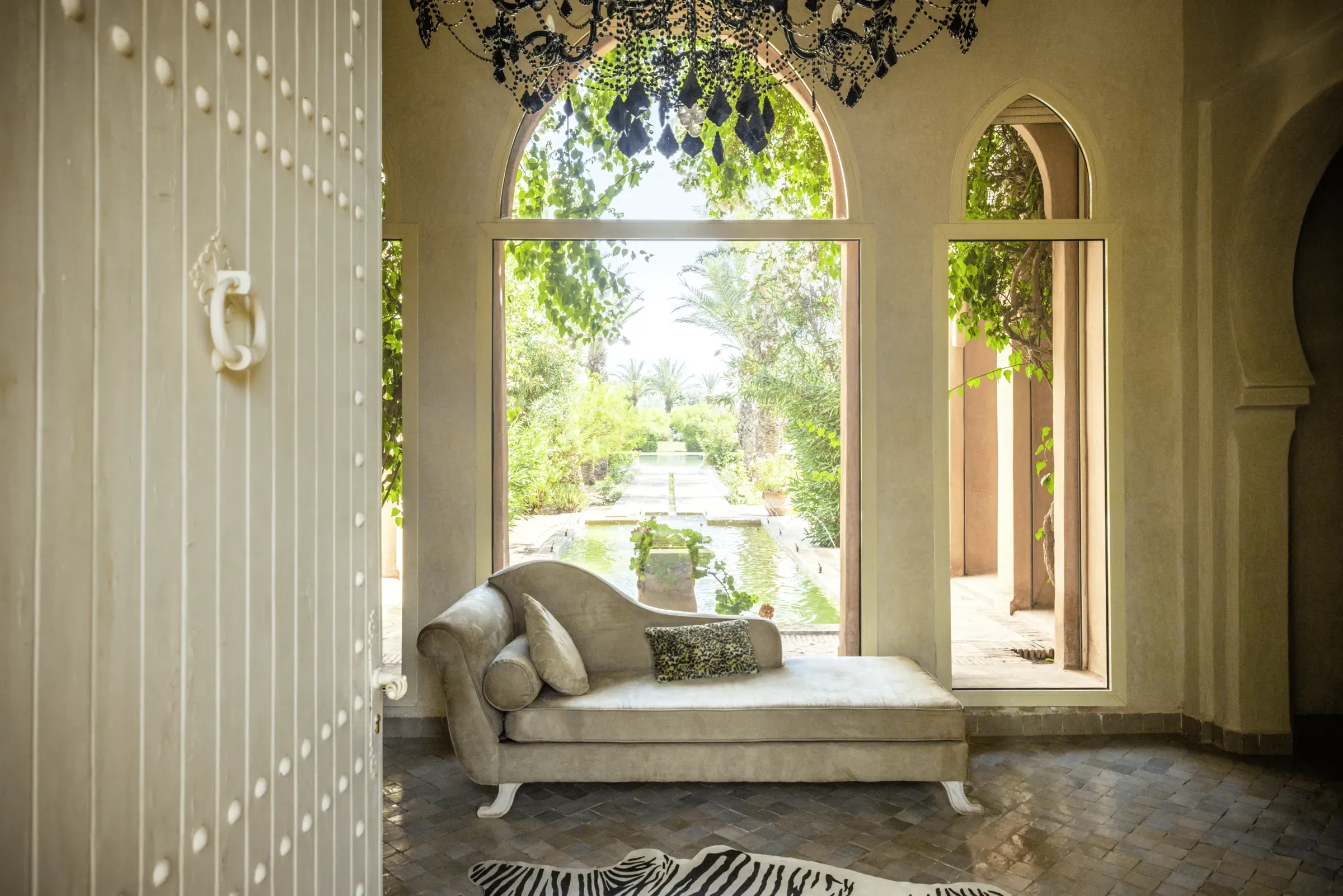 Villa Danae, private villa rental in Sidi Abdellah Ghiat, Marrakech: daybed by the arched windows