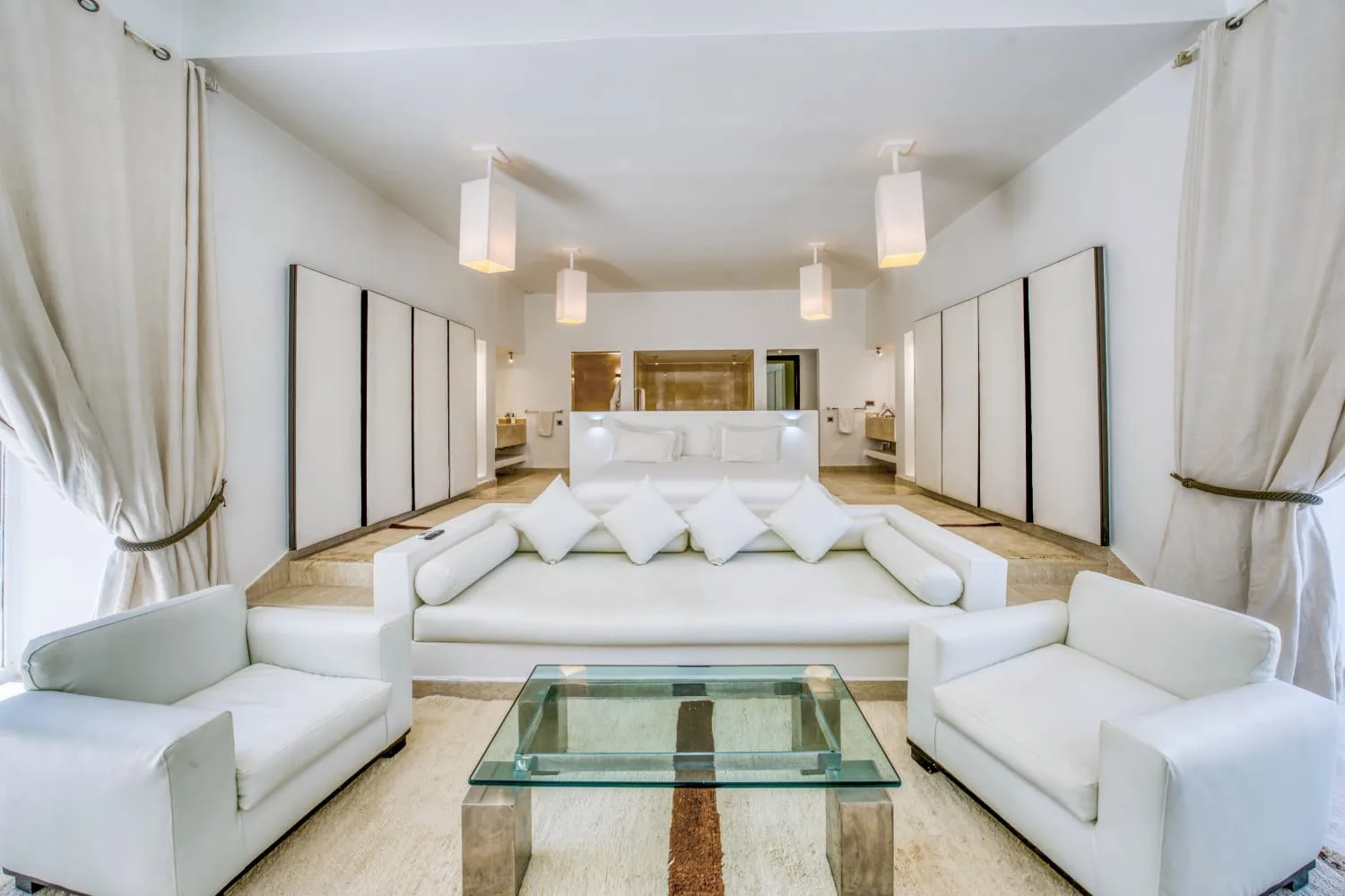 Villa Ianthe, private villa rental in the Palmeraie, Marrakech: white suite with lounge