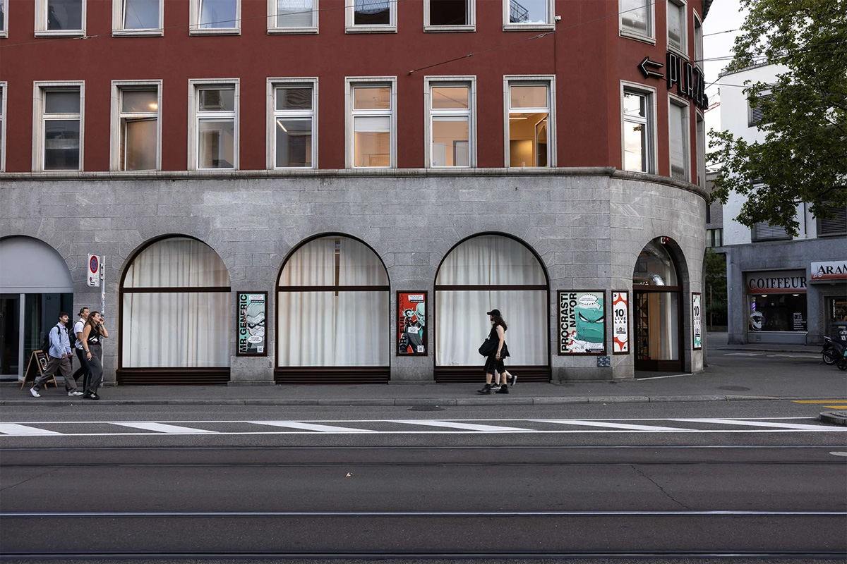 Exterior view of the Live Lab Office with event posters