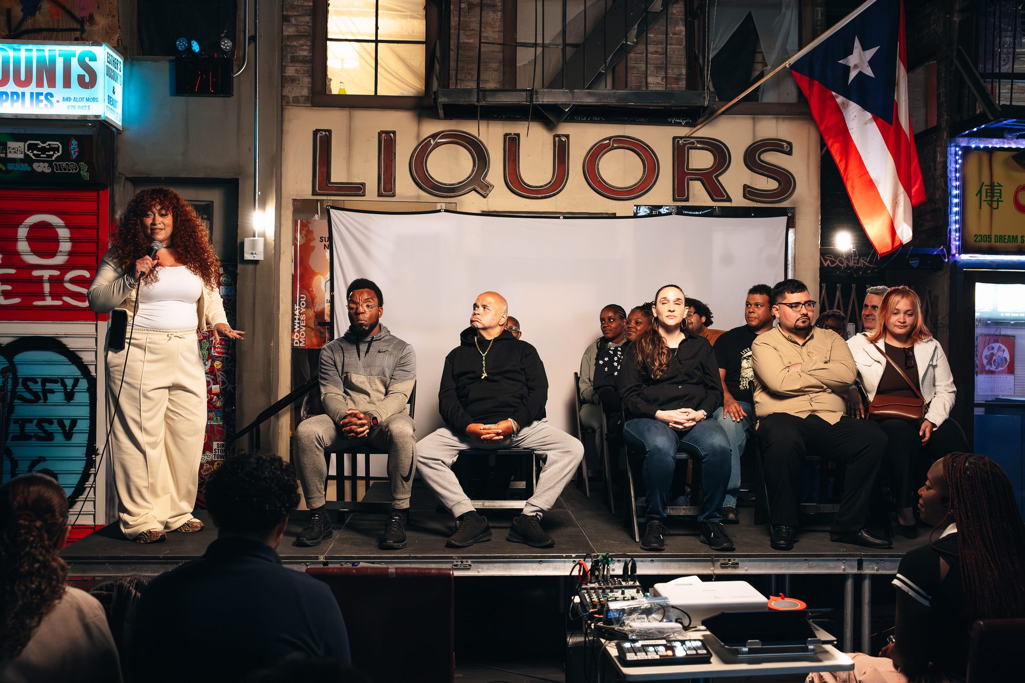 Cast members seated on stage at La Bodega NY for the conversation after the Minds of Our Own premiere