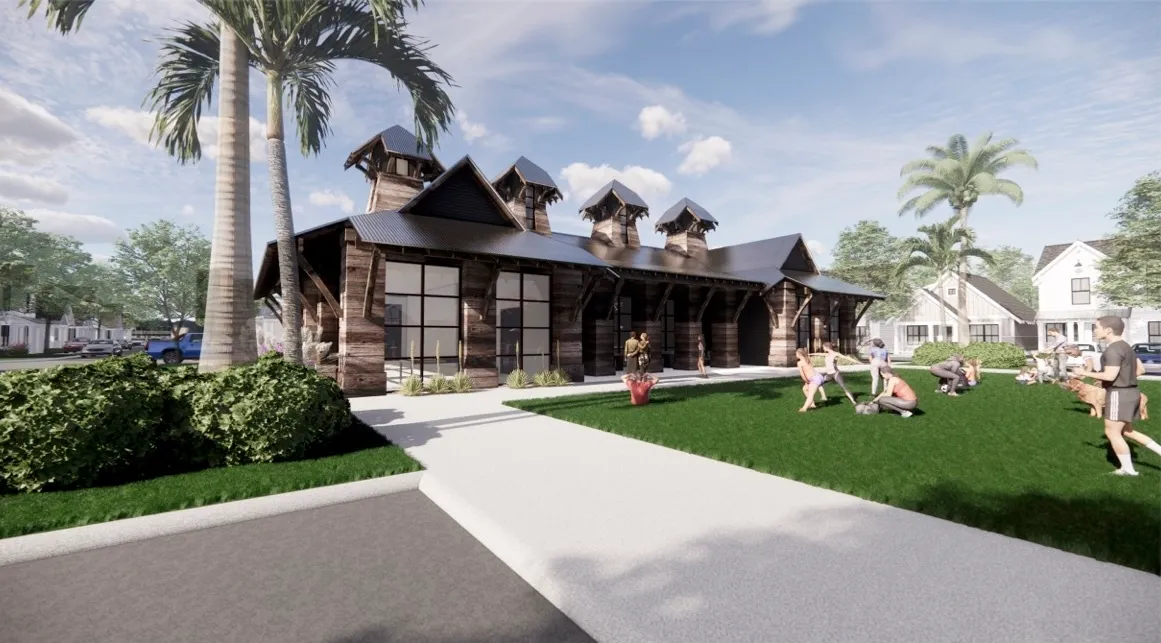 Exterior rendering of the modern clubhouse with residents and dogs playing on a grassy area at The Eleanor Daytona Beach in Daytona Beach, Florida.