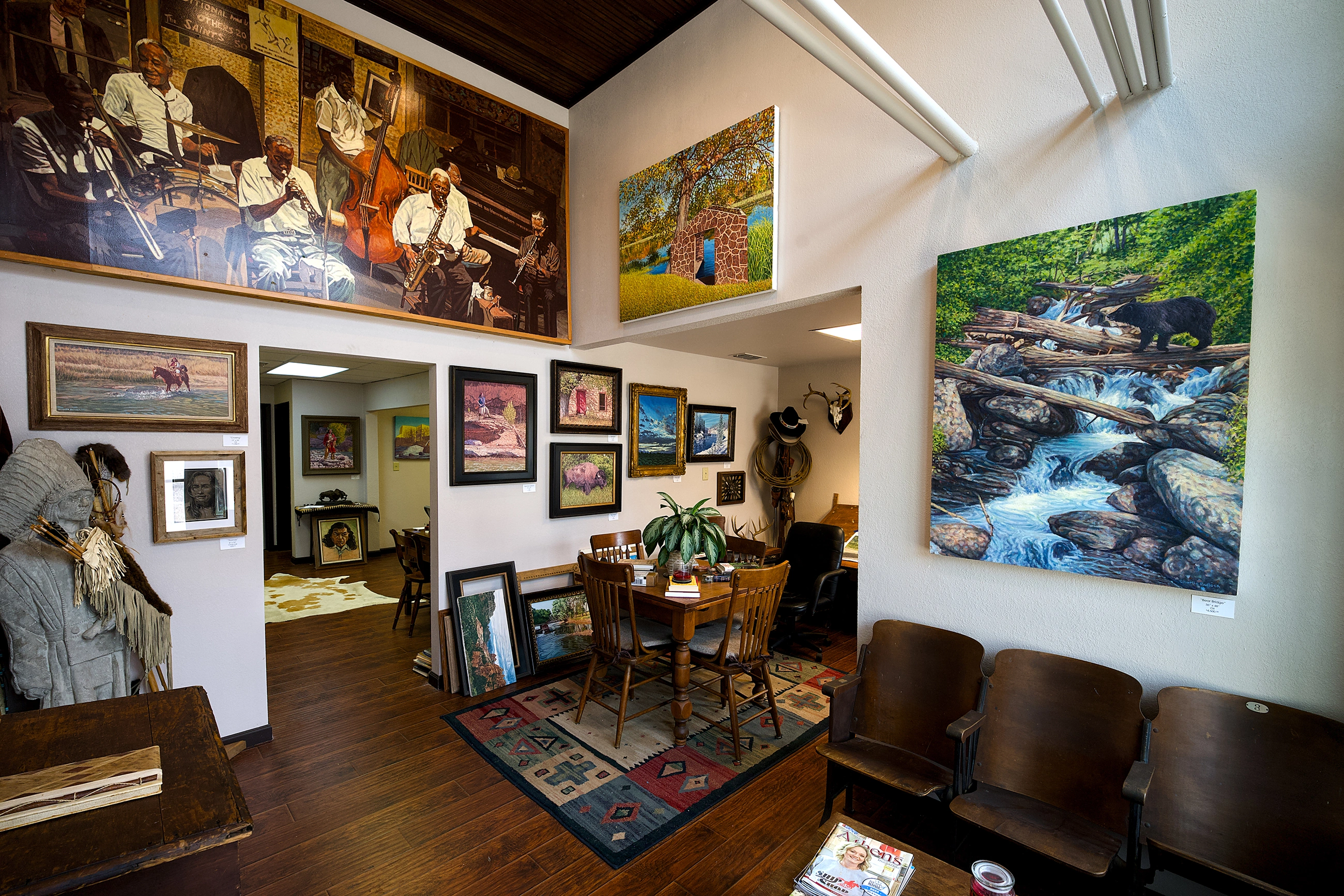 Photo of the interior of Charlie Bullock's Art Studio in Athens TX showcasing his western art