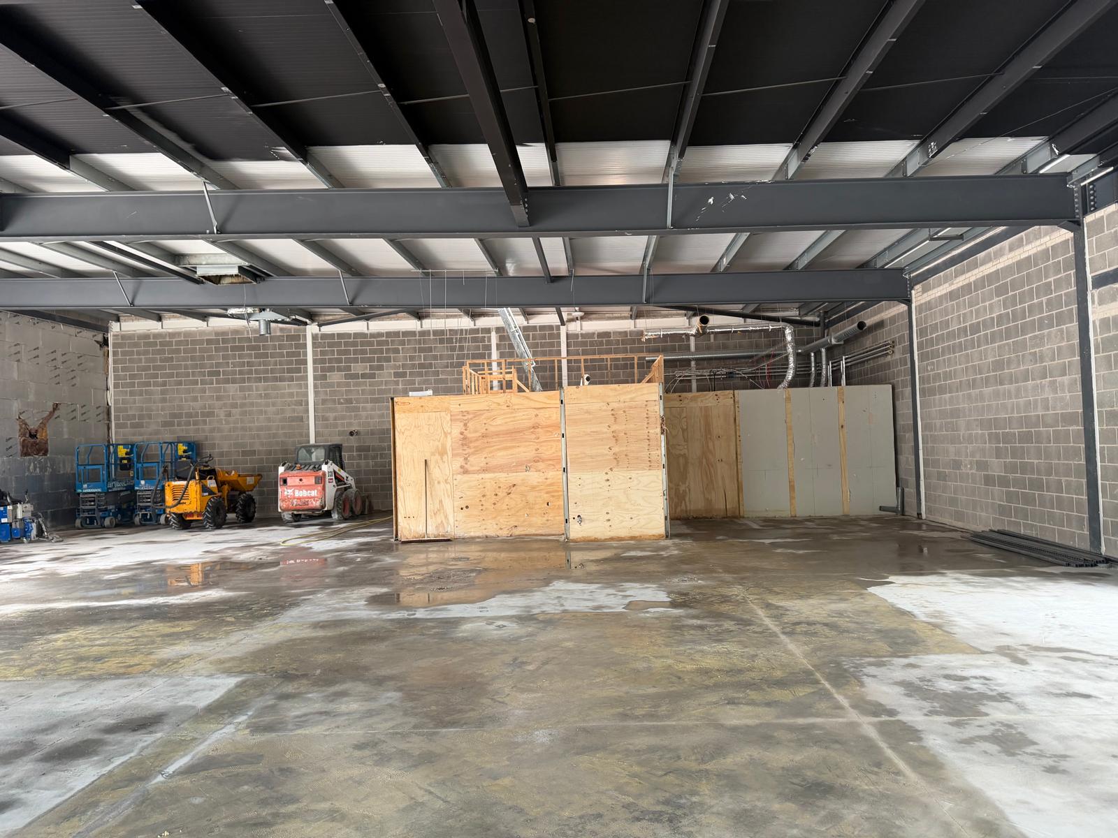 Restaurant stripped back to blockwork and steel shell