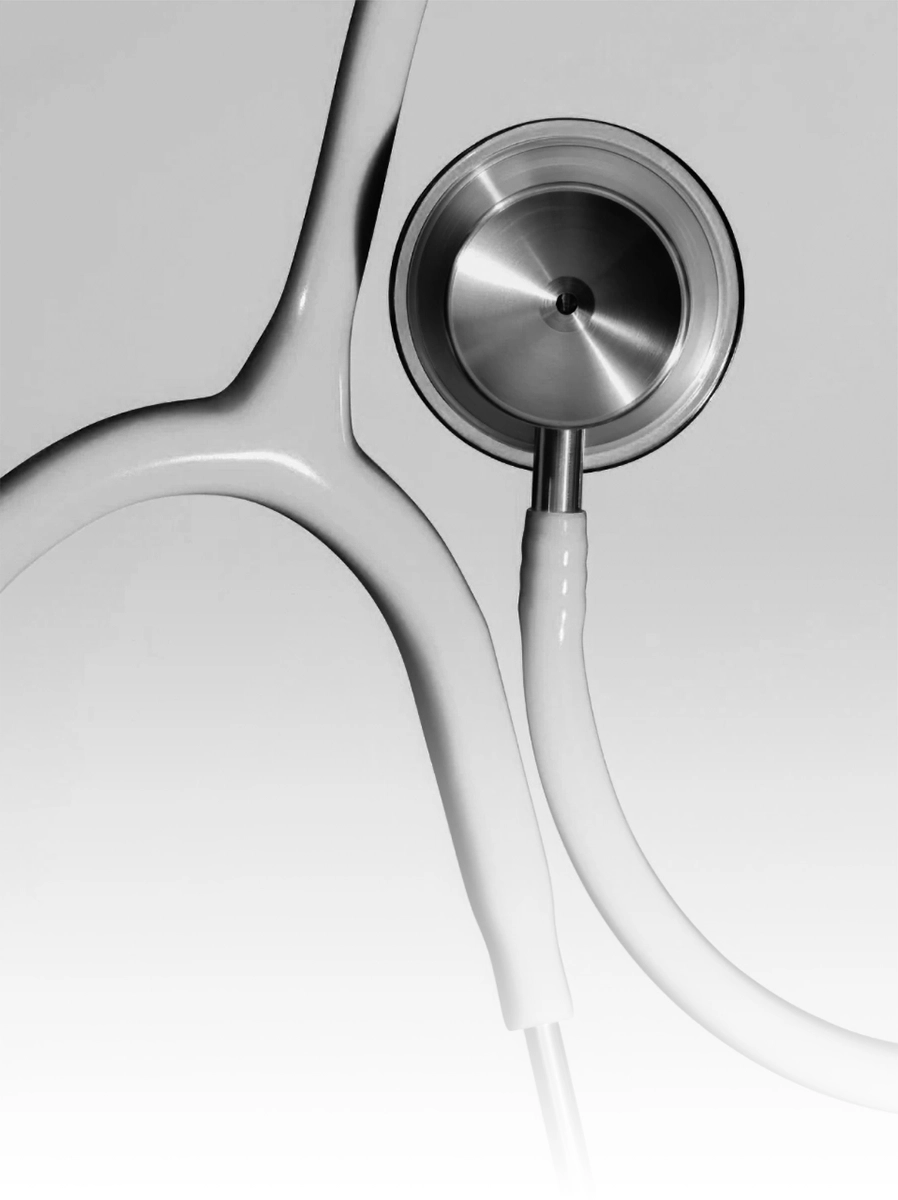 A close-up view of a metallic stethoscope chest piece, symbolizing a deep diagnostic review of current commercial positioning and sales infrastructure.