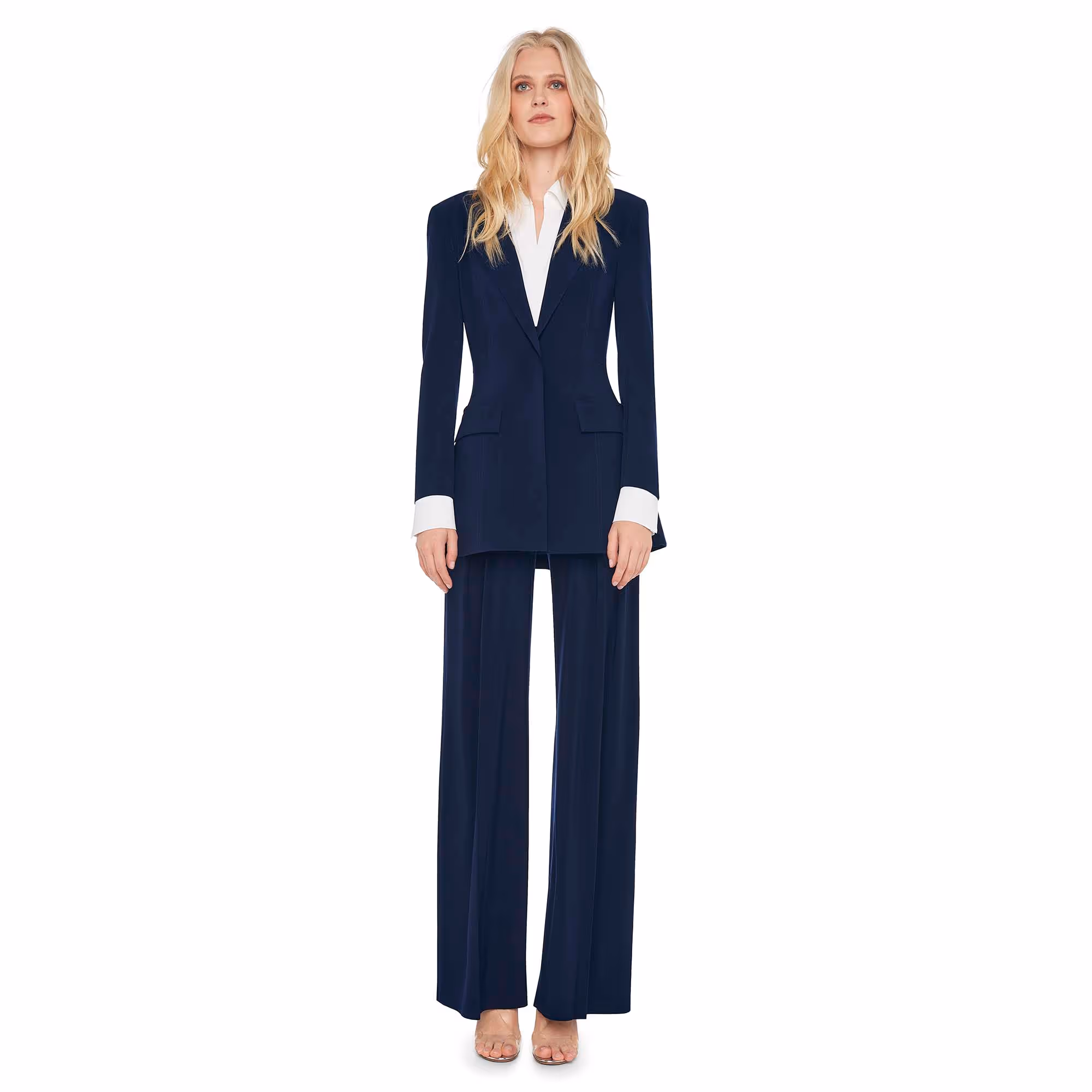 Full-length model wearing a navy suit over a white shirt