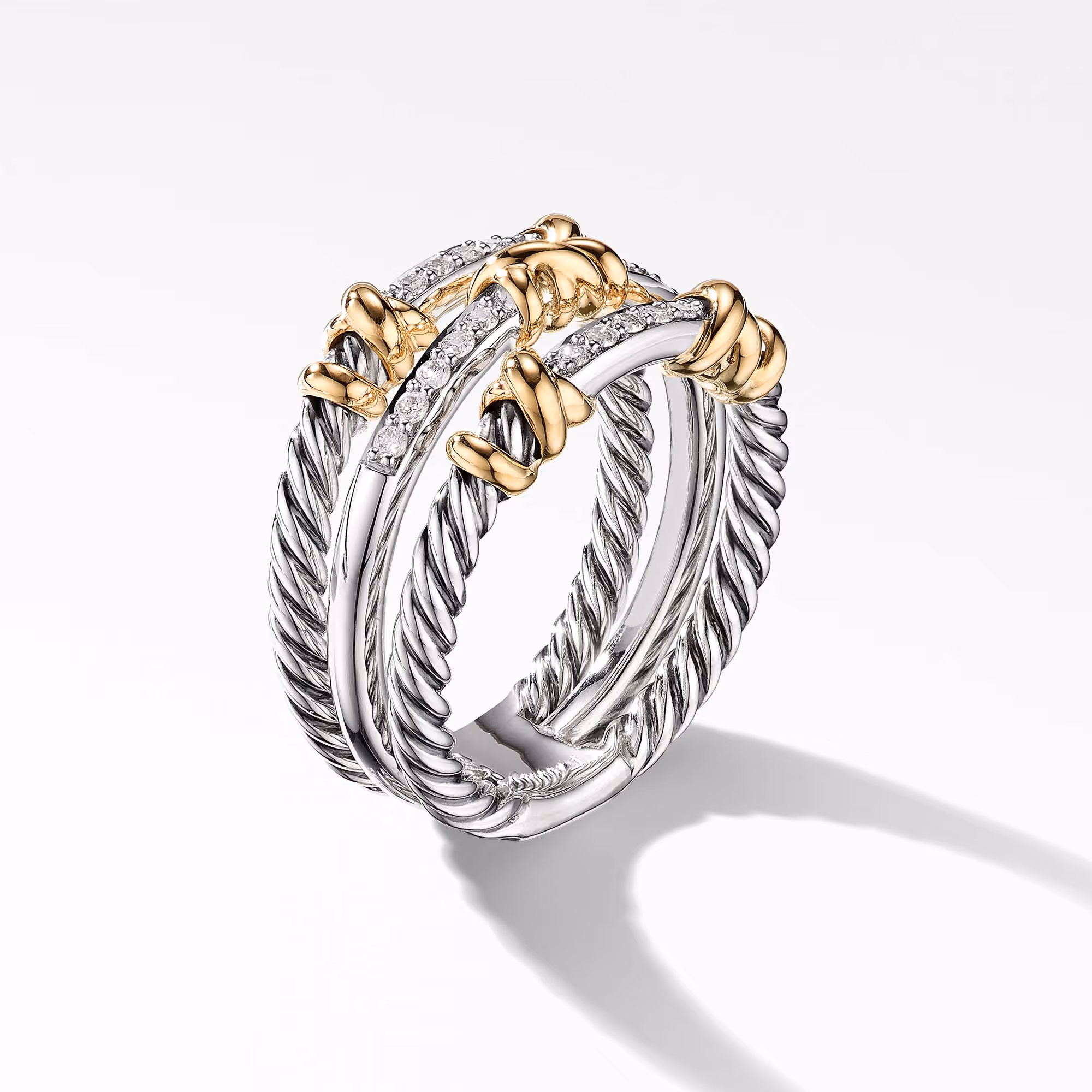 Silver and gold cable rings with decorative clasps