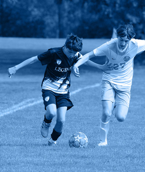 Legends player fighting for the ball