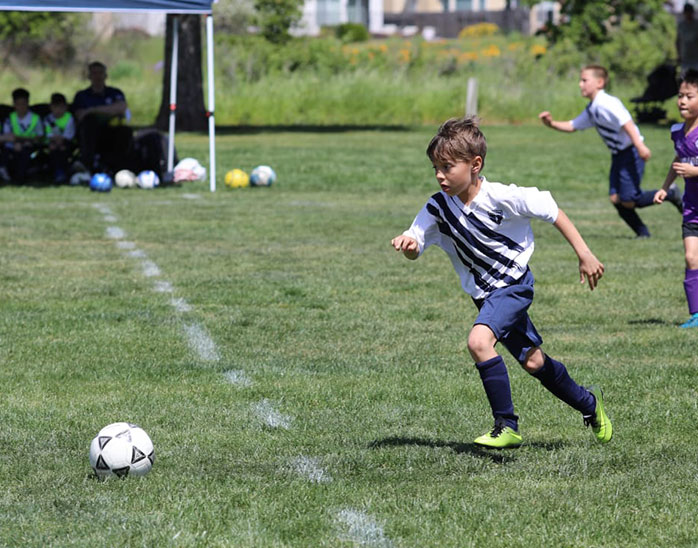 Legends player running with the ball