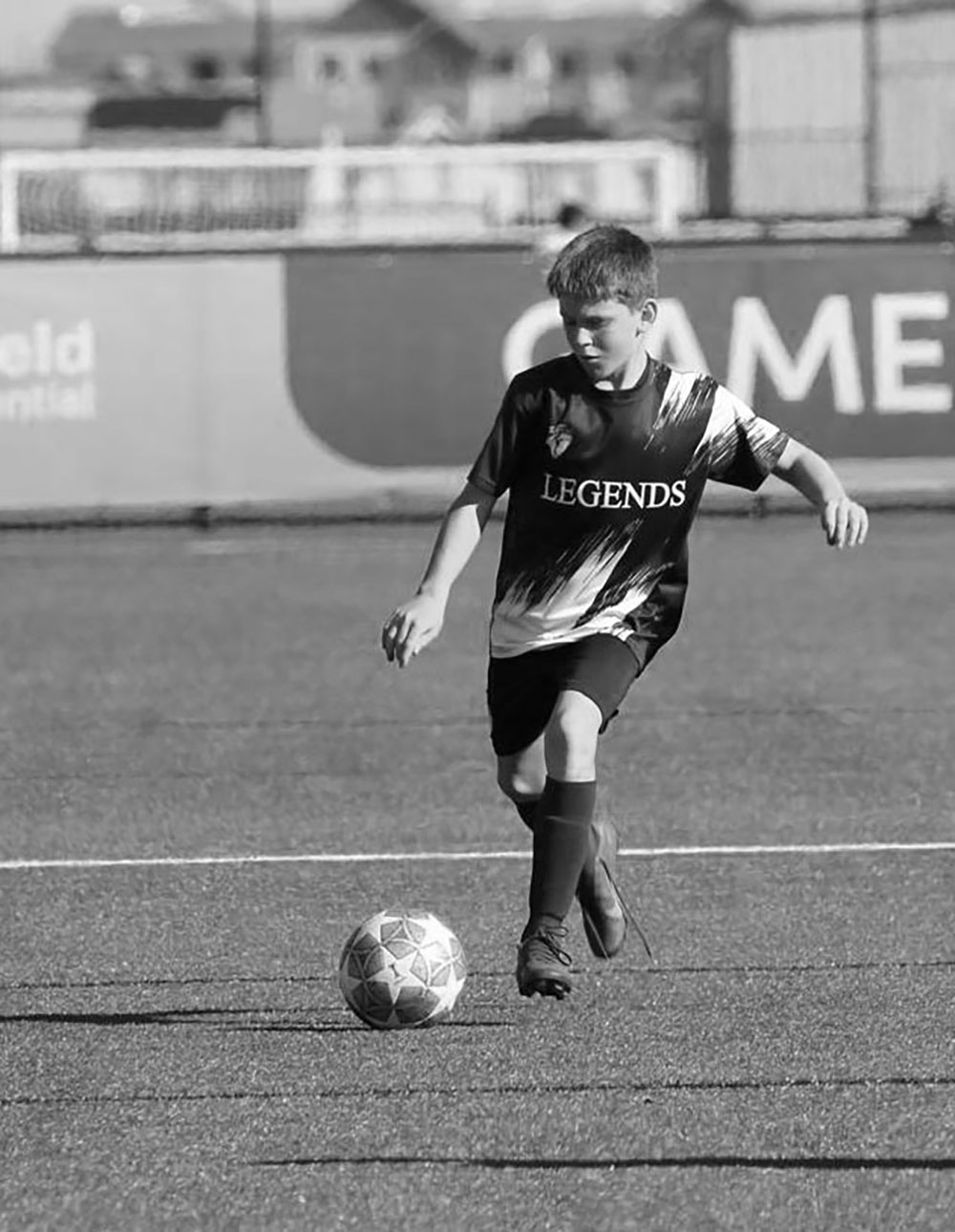 Legends player passing the ball