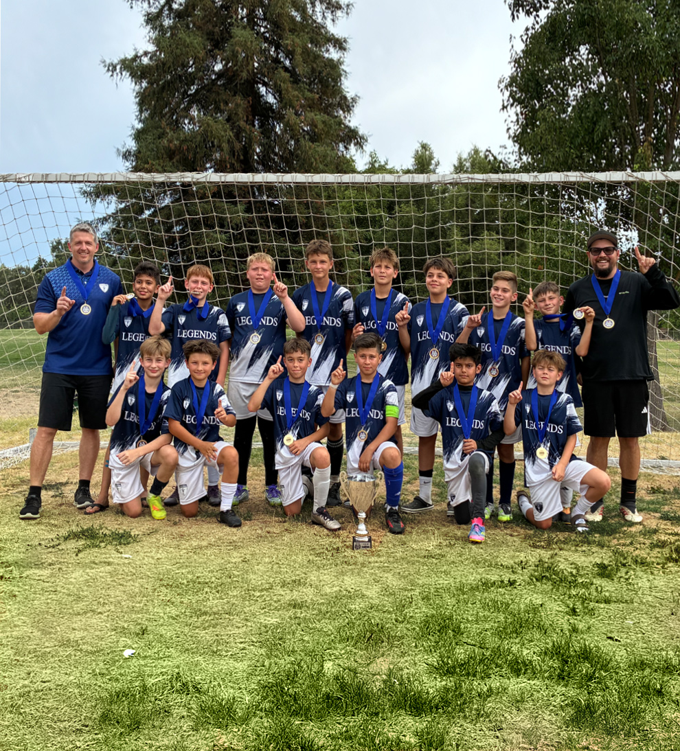 Legends 2014 boys team with Silver Cup the trophy