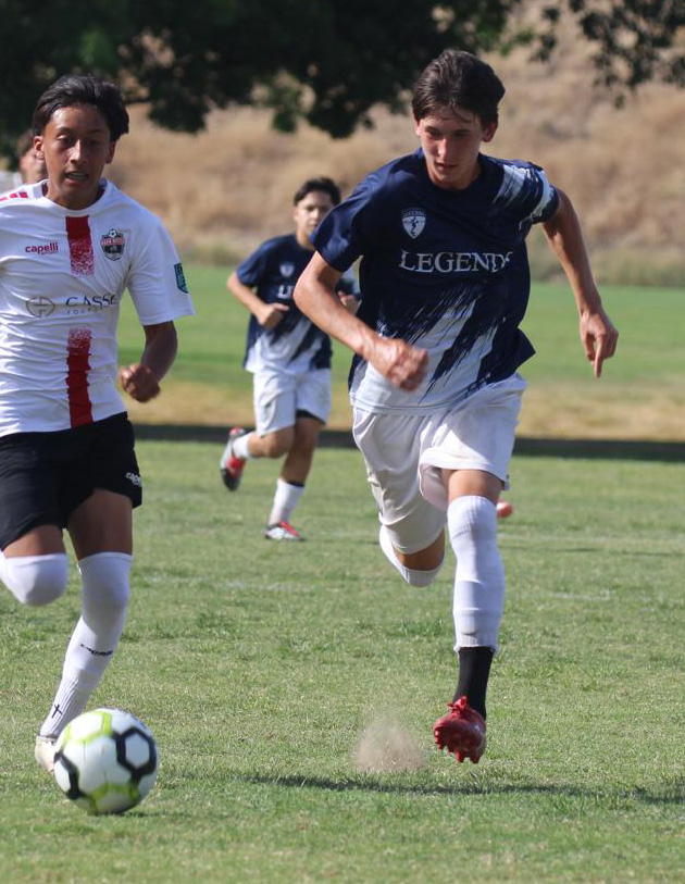 legends player possessing the ball