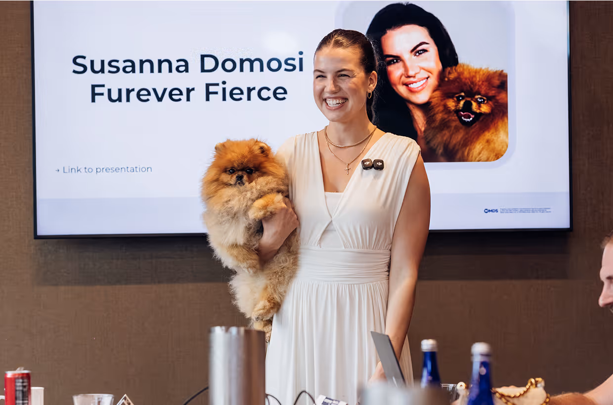 Founder speaking and engaging with attendees at an Ecompreneur event