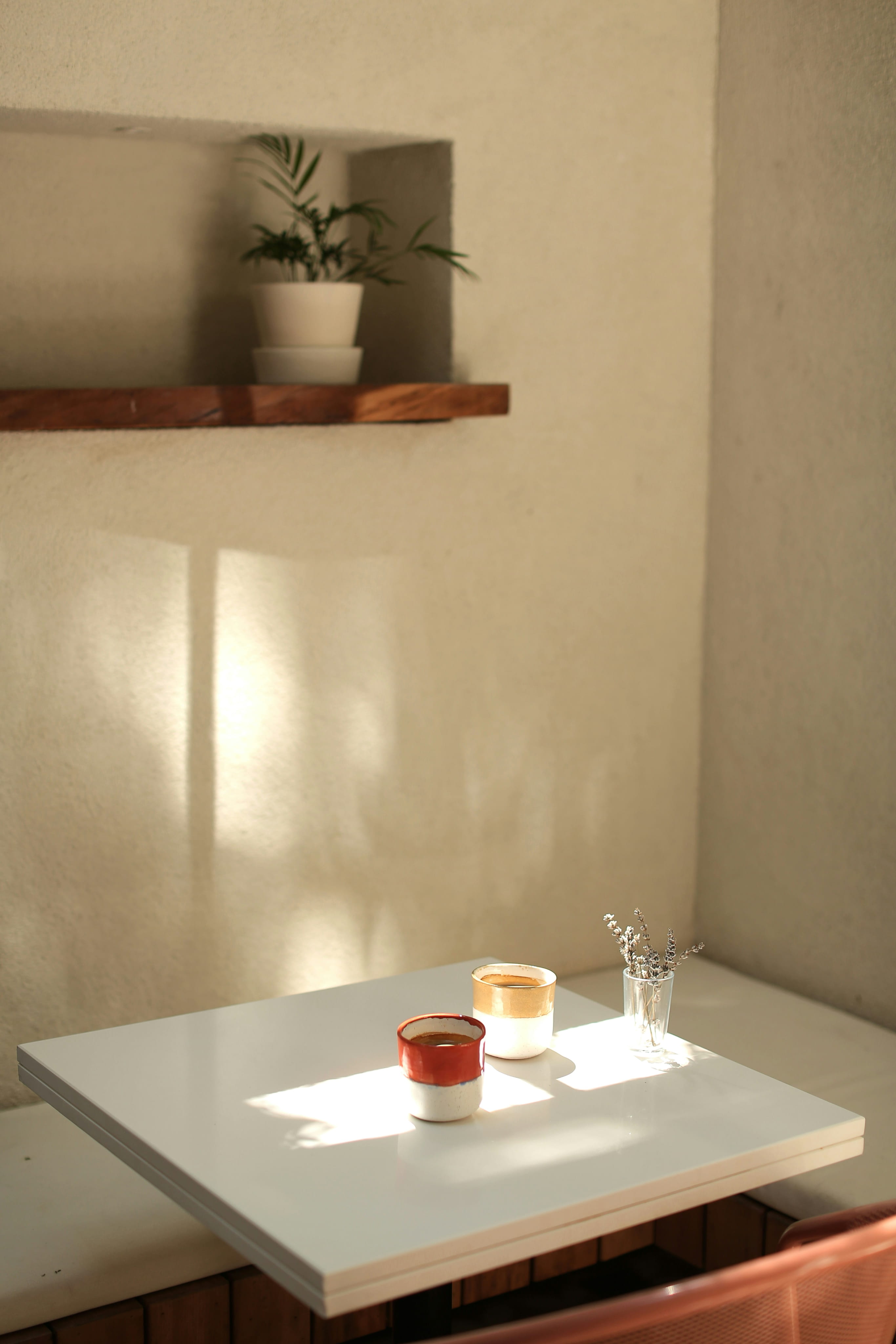 Inside of an apartment, table with coffee cups