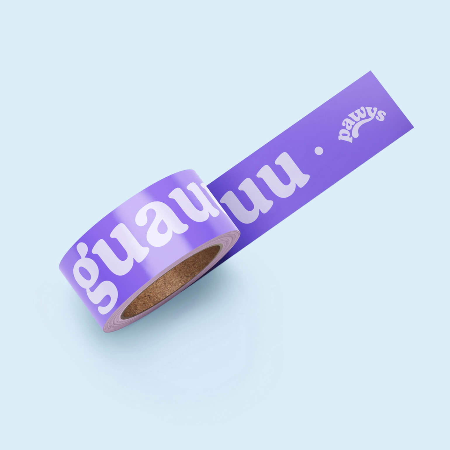 Rollo de cinta adhesiva morada de Pawys con tipografía de la marca y la palabra "guau" pieza de packaging y activación de marca para empresa colombiana de productos para mascotas, por Intacto Studio, estudio de branding y diseño en Medellín y Bogotá, Colombia.