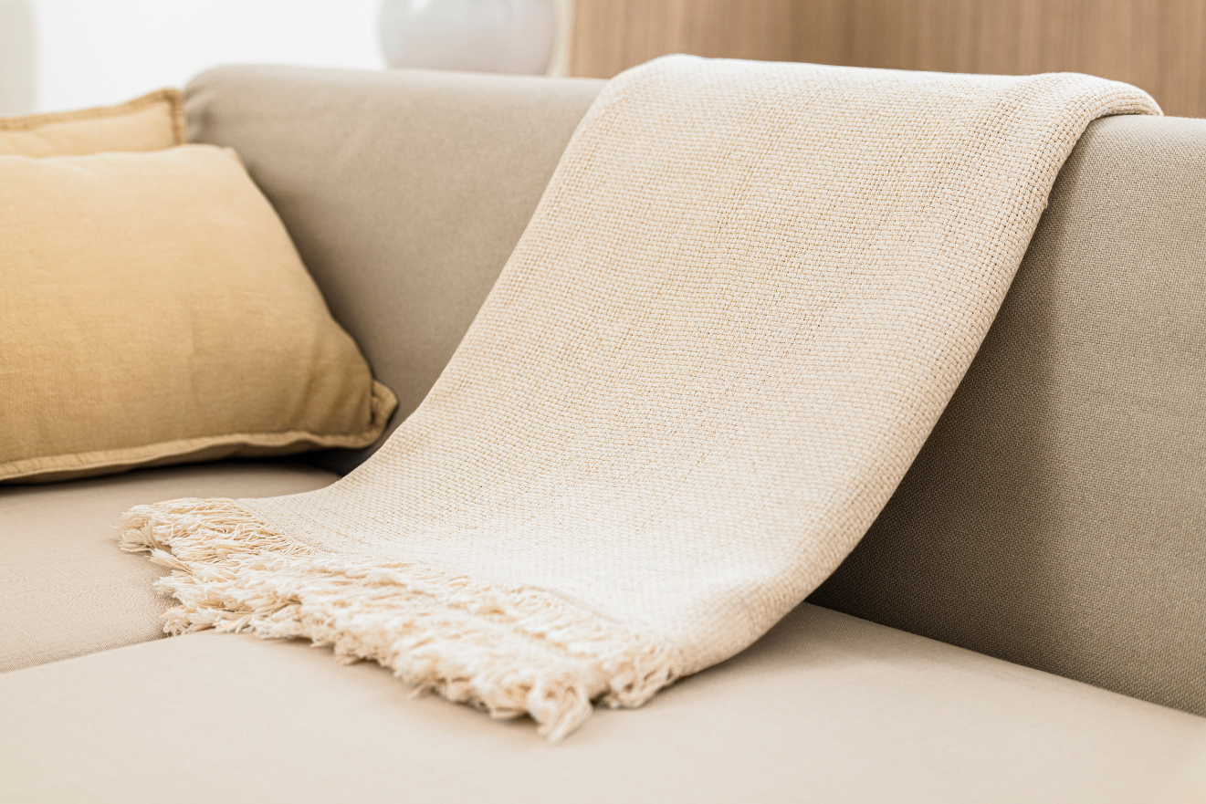 Sofa with blanket stock image