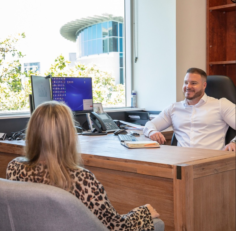 Client meeting with an A-Team Tax accountant in the Varsity Lakes office