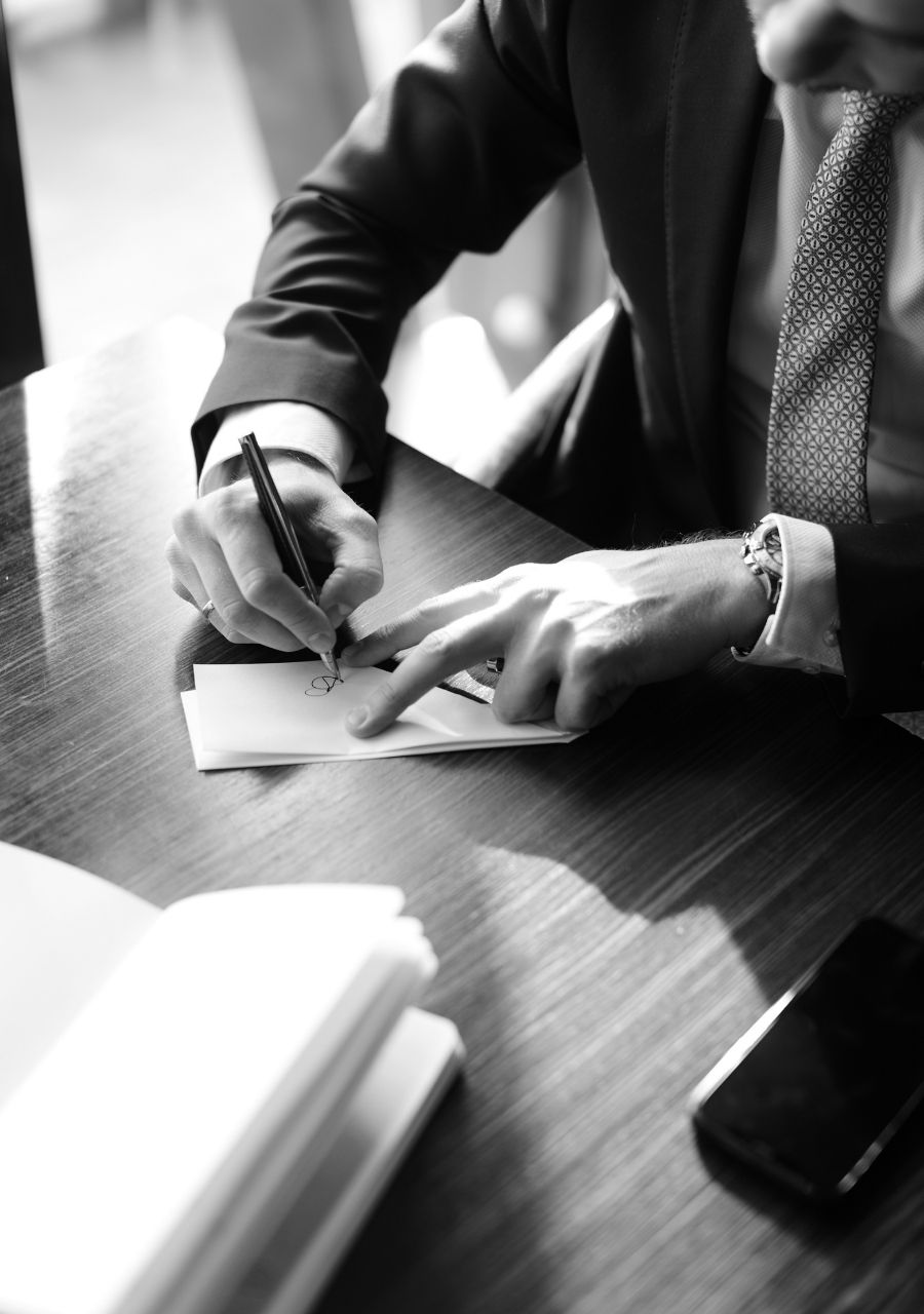 Accountant working through documents at a desk