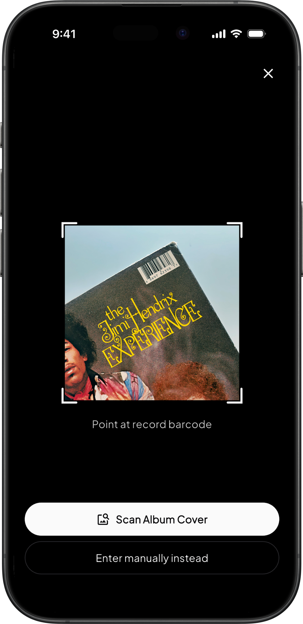 Groovv vinyl scanner app on iPhone scanning the barcode on a record sleeve