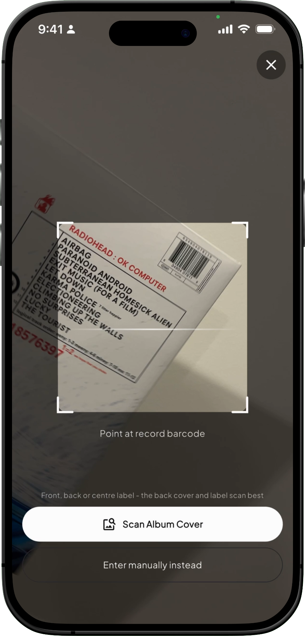 Scanning the barcode on a vinyl record with the Groovv app