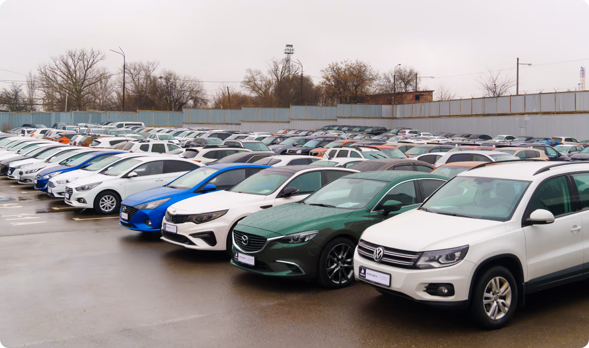 Dealership lot with variety of vehicles
