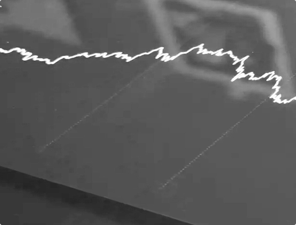 Close-up of financial trading chart with glowing price line on dark screen representing market data