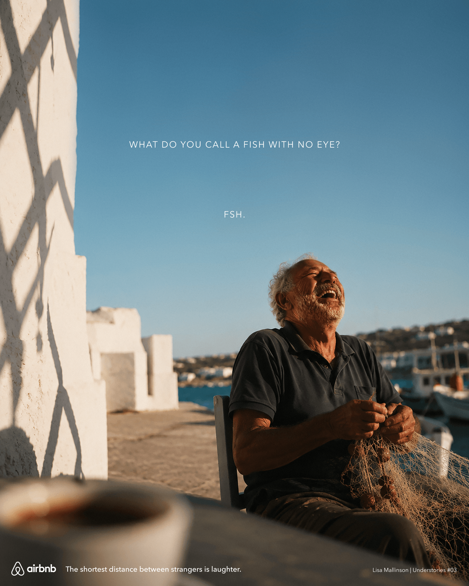 Airbnb concept poster showing an older fisherman laughing in a Mediterranean harbour while holding a fishing net. Text reads: “What do you call a fish with no eye? Fsh.” and “The shortest distance between strangers is laughter.”